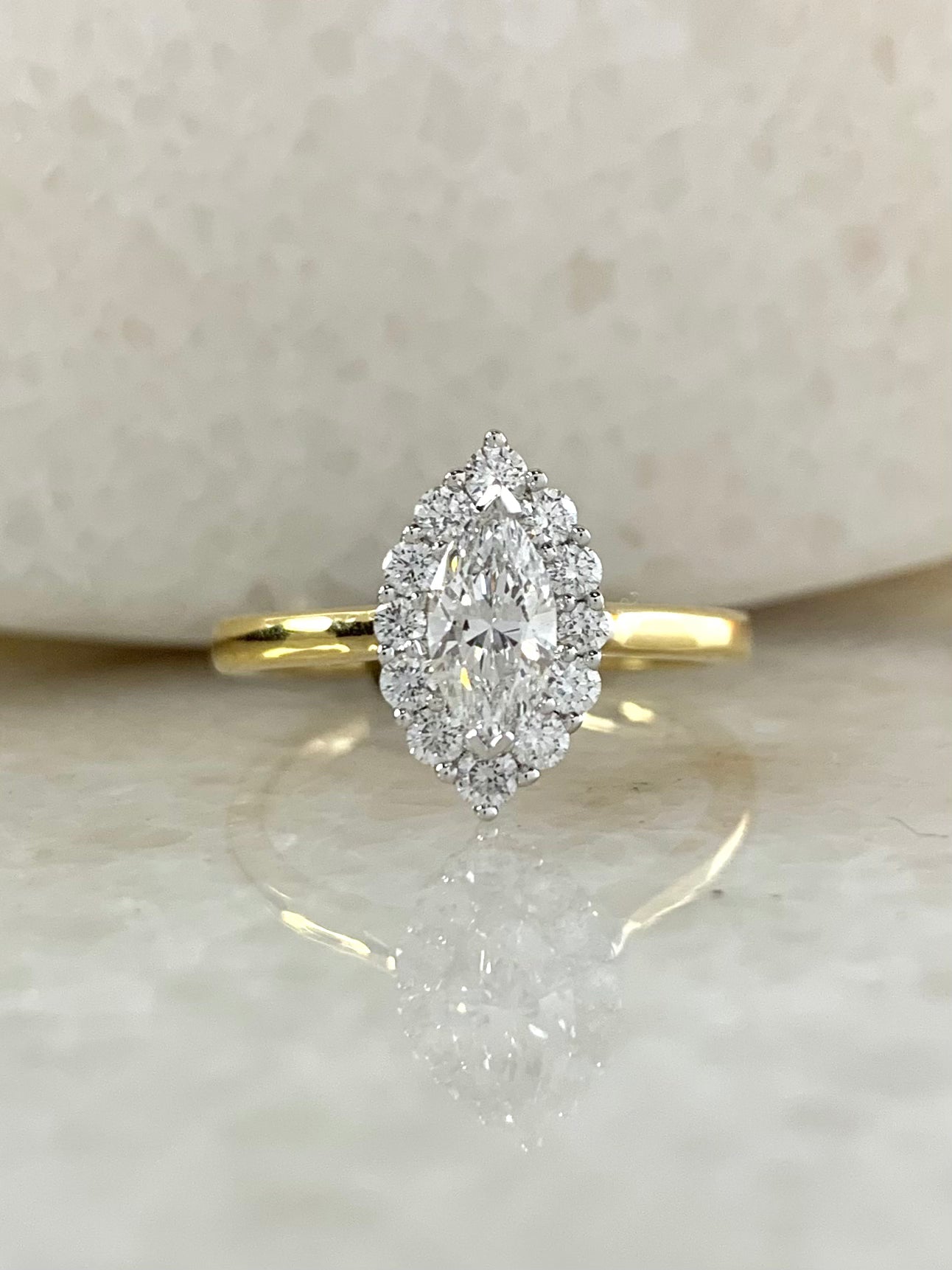 Marquise cut halo sales diamond engagement ring